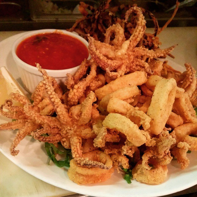 Fried Calamari tubs and tenticals ... Side of spicy tomato sauce. - from Instagram