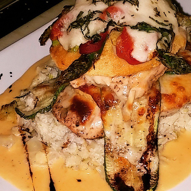 The #Chicken Stack. #GrilledChicken, fresh #mozzarella, #deepfried tomatos, #roastedpeppers, grilled zucchini & #asparagus, spicy jack cheese, mash #cauliflower #leeks, chedder sauce and that's it. Enjoy - from Instagram
