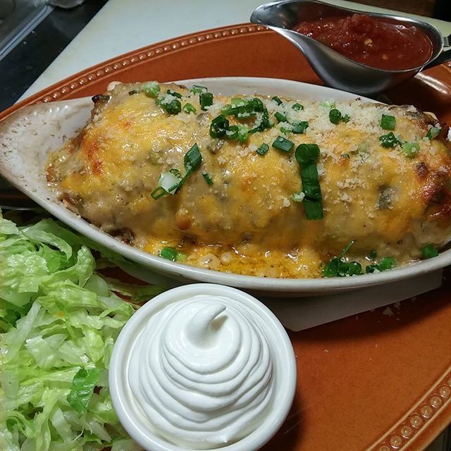 Chicken Enchiladas.... Ground chicken is sauteed with garlic, onions, mushrooms, green chilis and black olives. Then wrapped in a flour tortilla topped with a mushroom bechamel & cheddar cheese baked till golden.Oh soooooo tasty.. #enchiladas #greenchili #southorange #brewpub #mexicanfood - from Instagram